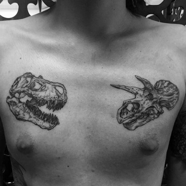 Mens Chest Grey Dinosaur Remains Tattoo