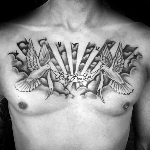 Mens Chest Tattoo Of Doves Holding Banner In Clouds