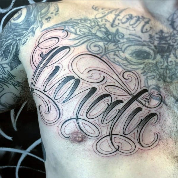 Mens Chest Tattoo Of Lunatic Word Script Design