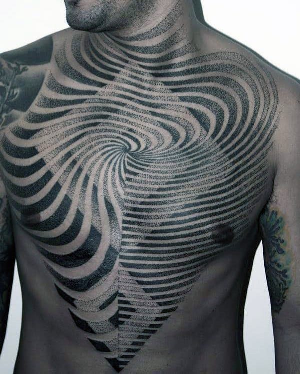 Man with an intricate black and white geometric tattoo covering his chest and shoulders