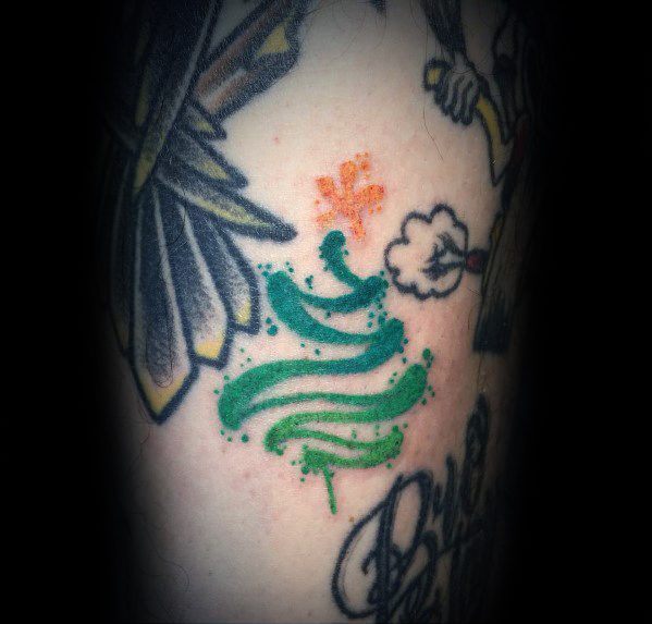 Abstract Christmas tree tattoo with green watercolor-style brushstrokes, subtle splatter effects, and a small orange star for a modern festive look.