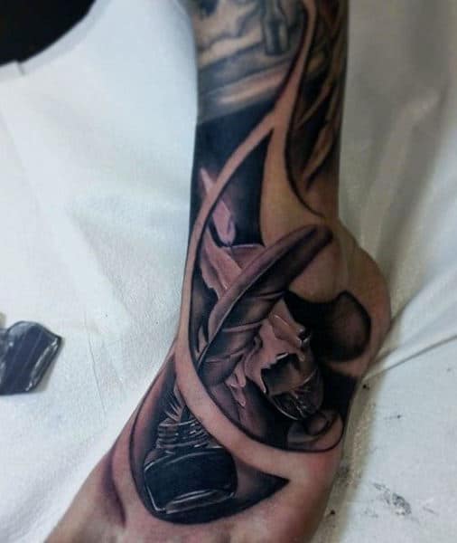 Mens Classy Black Feather Tattoo On Ankle And Foot