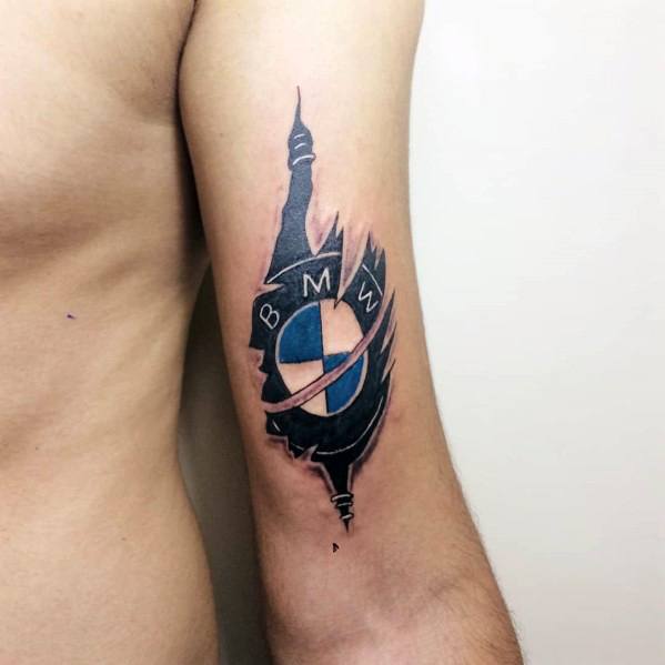 Bold BMW logo tattoo on upper arm, featuring a ripped skin effect with blue and black shading for a striking 3D automotive design.