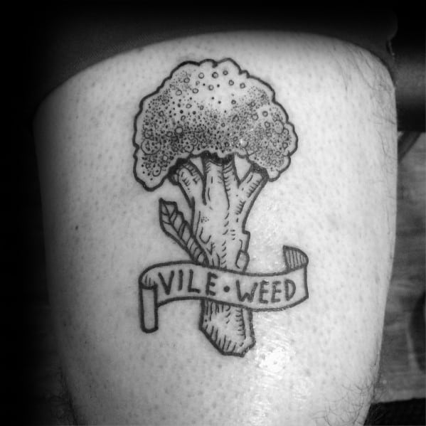 Black ink broccoli tattoo with a vintage banner reading "Vile Weed," featuring fine dot work and bold outlines for a classic and humorous design.