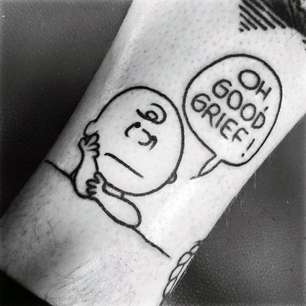 Black and white Charlie Brown tattoo featuring his classic 'Oh, Good Grief!' expression, capturing Peanuts' humor and timeless frustration.