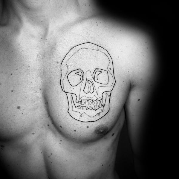 Minimalist continuous line skull tattoo on the chest, featuring bold black ink with geometric details for a modern and edgy design.