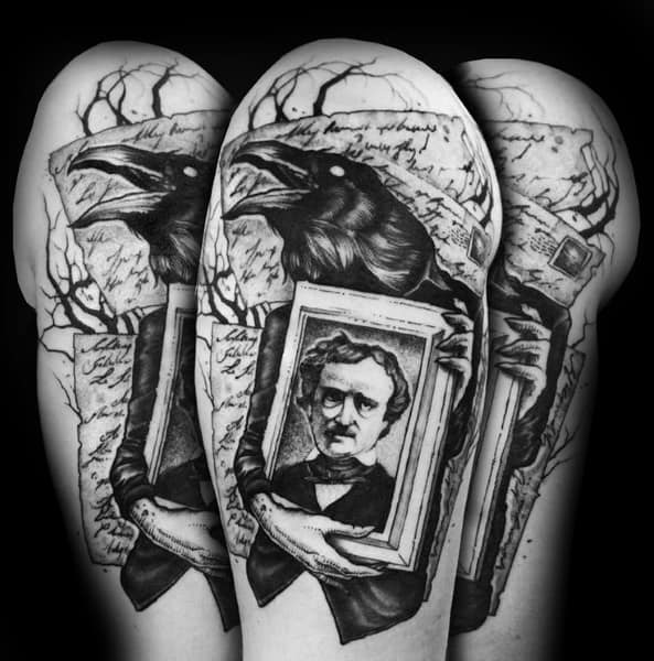 Black and grey tattoo of a raven holding a framed portrait of Edgar Allan Poe, set against eerie trees and handwritten script.