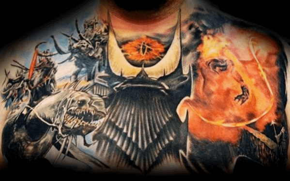 Detailed fantasy tattoo featuring the Eye of Sauron, intricate armor, majestic horses, and mysterious figures