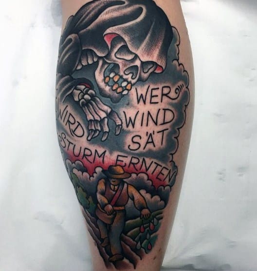 Bold traditional-style tattoo featuring a grim reaper above a farmer sowing seeds, with the German phrase "Wer Wind sät, wird Sturm ernten."