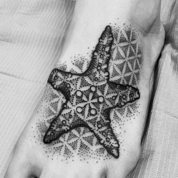 Geometric dotwork starfish tattoo on the foot, blending mandala-style patterns with textured shading and symmetrical background design.