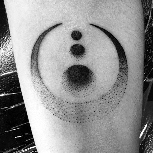 Black and grey dotwork tattoo featuring three stacked circles within a crescent arc, fading into a gradient of fine stippling.