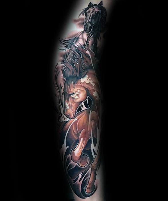 Full sleeve tattoo of two dynamic horses in motion, blending black and brown tones with abstract swirls and light bursts for dramatic effect