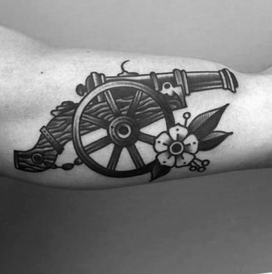 Mens Cool Iner Arm Bicep Traditional Flower With Cannon Tattoo Ideas