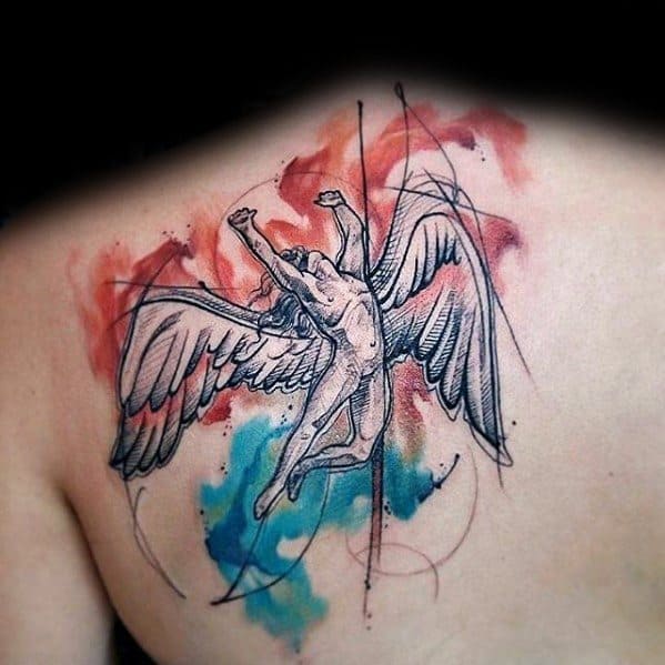 Back tattoo of the winged Icarus figure from Led Zeppelin’s Swan Song logo, with abstract red and blue watercolor-style accents.