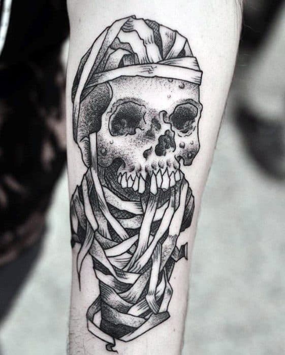 Blackwork tattoo of a decaying skull wrapped in bandages, inspired by Metallica's "Damage, Inc." artwork and classic thrash metal style.