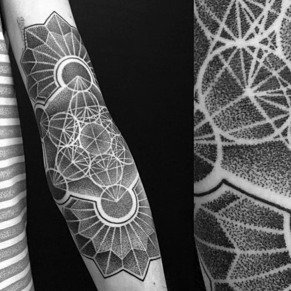Metatron’s Cube tattoo with dotwork mandala elements and geometric shading, creating a bold and symmetrical forearm design.
