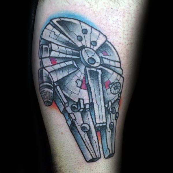 Colorful Millennium Falcon tattoo with bold outlines, red accents, and blue shadowing for a cartoon-inspired sci-fi look.
