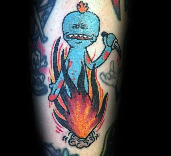 Tattoo of an angry Mr. Meeseeks from Rick and Morty emerging from flames, holding a dagger with a menacing expression.