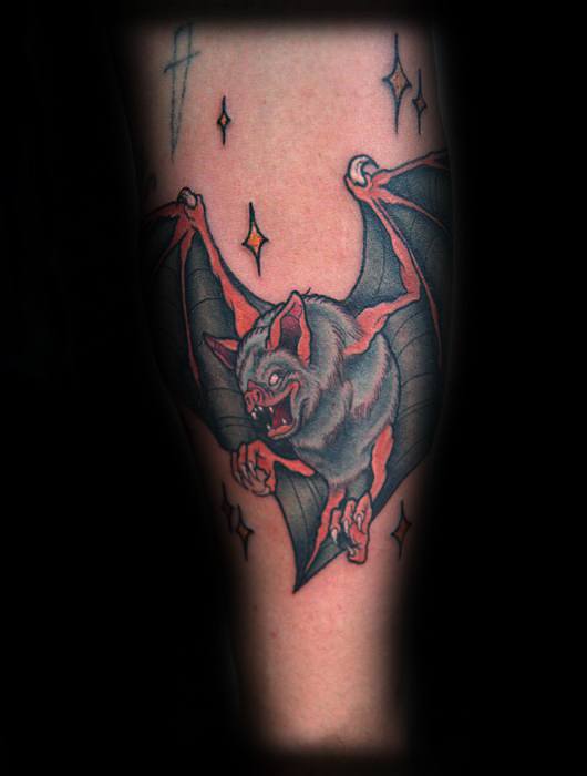 Neo-traditional tattoo of a fierce flying bat with outstretched wings, surrounded by sparkling stars on a dark background.