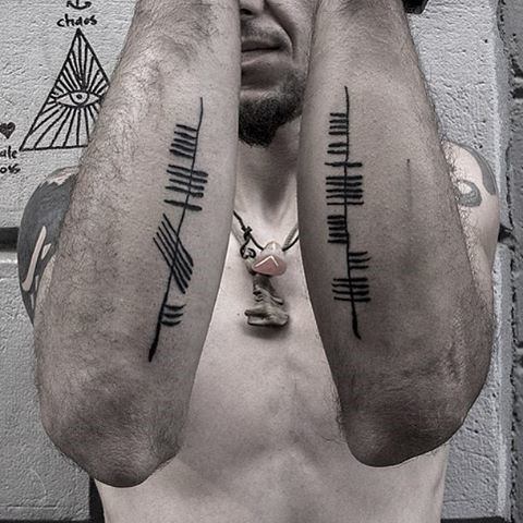 Mens Cool Ogham Tattoo Ideas On Outer Forearms