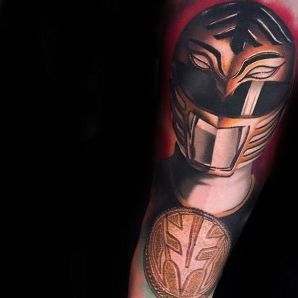 White Ranger tattoo with dramatic lighting, golden armor details, and a red aura background for a bold and powerful forearm design.