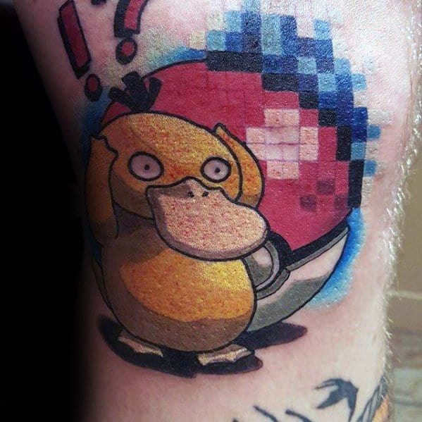 Bold Psyduck tattoo with a confused expression, pixelated Poké Ball background, and red punctuation marks, inked on a man's leg.