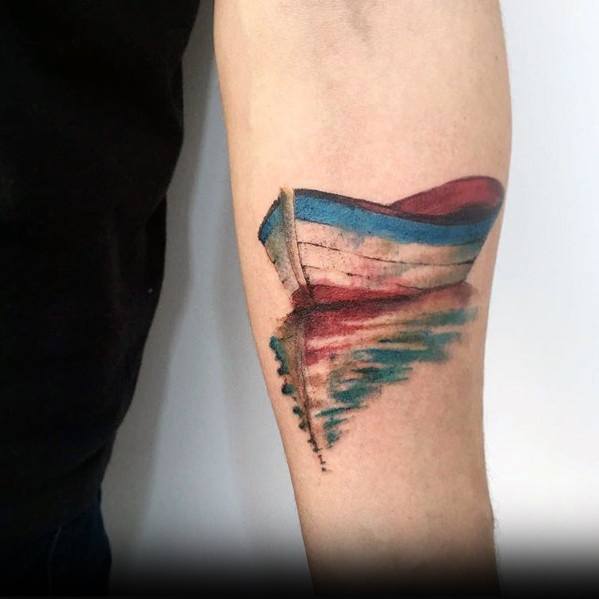 Tattoo of a colorful boat with its reflection in the water, featuring a watercolor effect for a soft, artistic, and serene design.