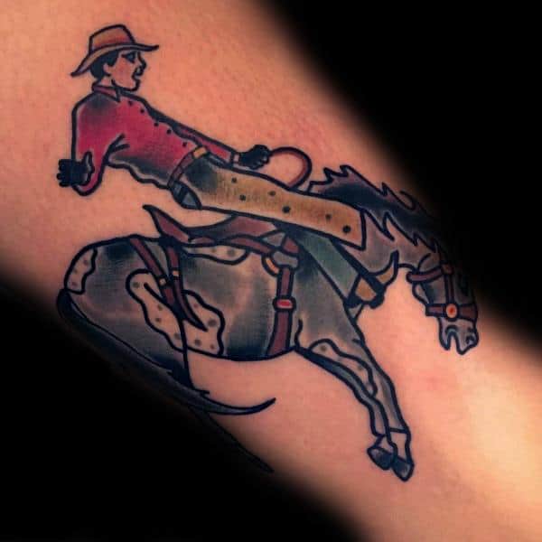 Traditional-style tattoo of a cowboy riding a bucking horse, featuring bold outlines, simple shading, and a classic Western rodeo theme.