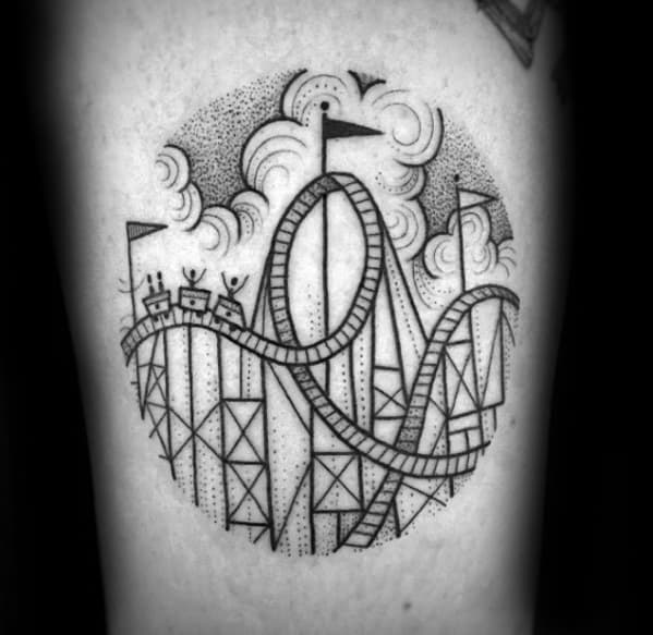 Circular roller coaster tattoo with dotwork shading, excited riders, tall loops, flags, and swirling clouds in the background.