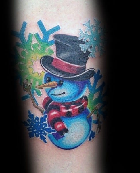 Colorful snowman tattoo with a top hat, red-striped scarf, and vibrant snowflakes, creating a cheerful and festive winter design.