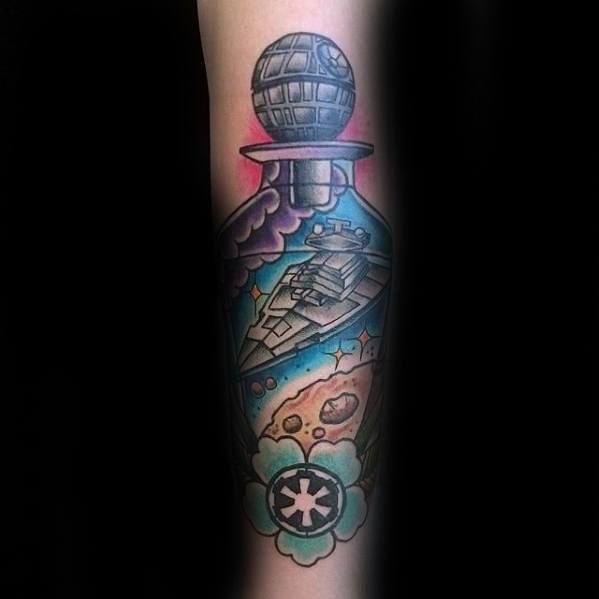 Colorful Star Destroyer tattoo inside a space-themed bottle with the Death Star stopper and Galactic Empire emblem at the base.