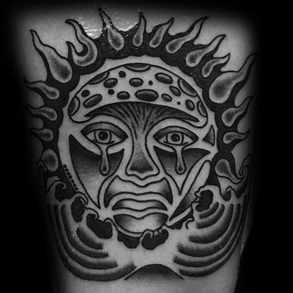 Black and grey Sublime sun face tattoo with bold shading, dramatic teardrops, and stylized waves beneath the fiery rays.