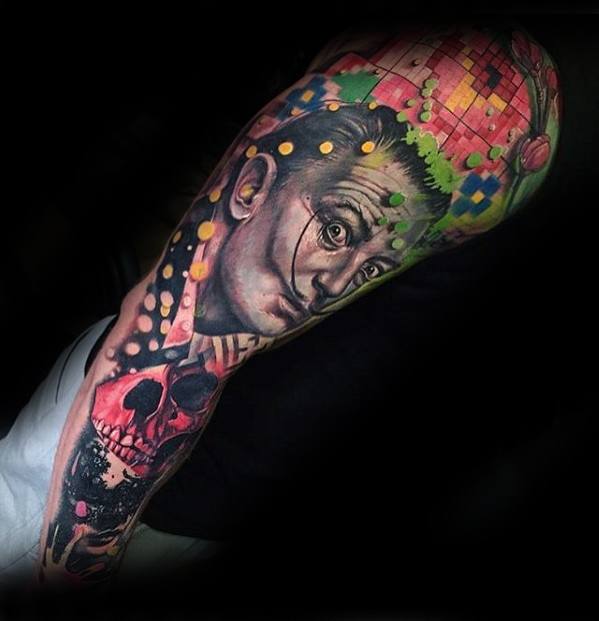 Vibrant surrealist tattoo sleeve featuring a portrait of Salvador Dalí, colorful mosaic patterns, and a red skull.