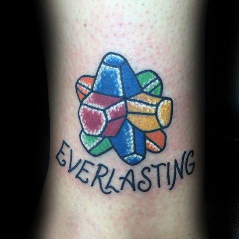 Brightly colored Everlasting Gobstopper tattoo with bold outlines and the word Everlasting written beneath in playful script.
