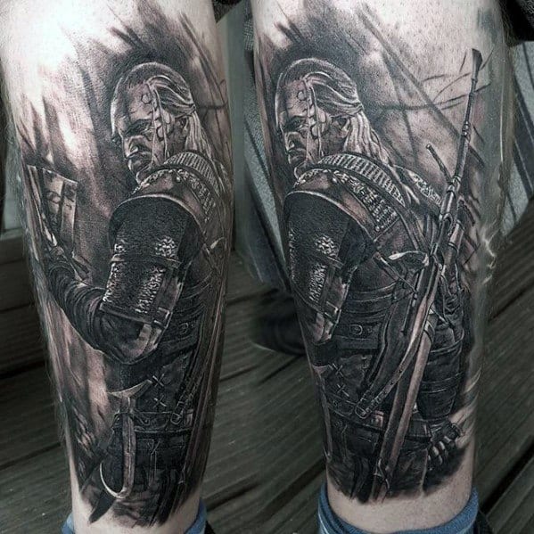 Highly detailed black and grey Witcher tattoo showing Geralt from behind with swords on his back, ready for battle.