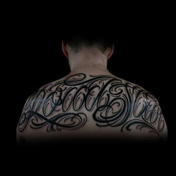 Mens Decorative Script Upper Back Black Ink Tattoo Design Inspiration