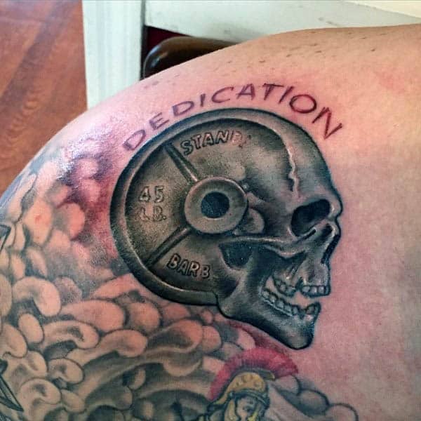Mens Dedications Skull With Weight Fitness Tattoo On Upper Chest