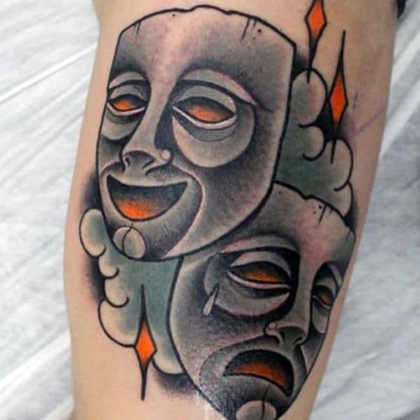 Mens Drama Mask Tattoo With Old School Traditional Design On Inner Arm Bicep