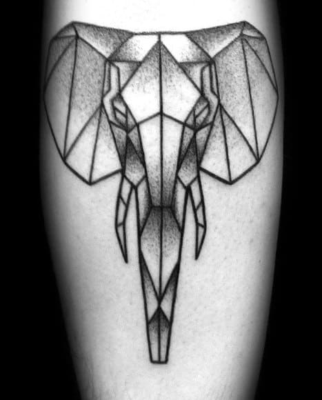 Geometric elephant head tattoo with angular lines and dotwork shading, creating a bold and symmetrical look on the forearm.