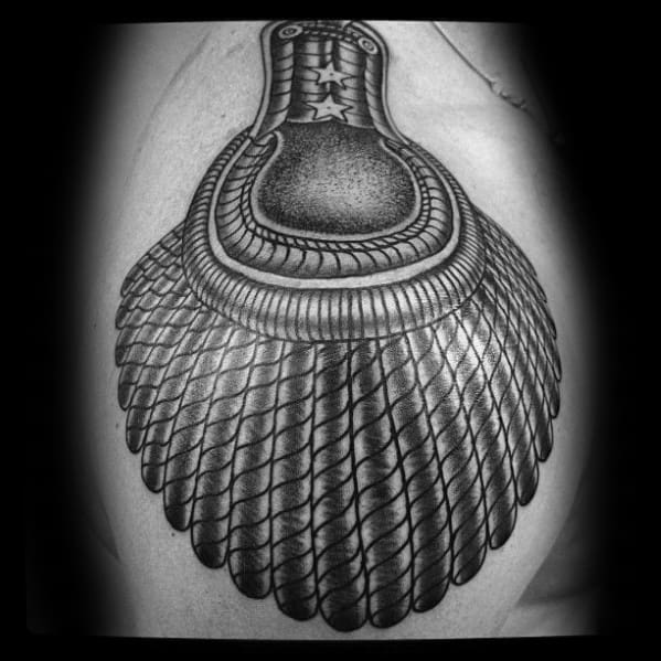 Large epaulette tattoo with layered scale-like tassels, bold textures, and a two-star insignia on the upper shoulder.