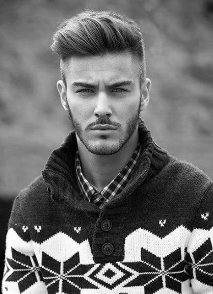 Sleek, side-swept top with a high fade on the sides and back
