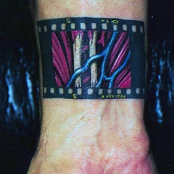 Mens Film Strip With Muscle On Wrist