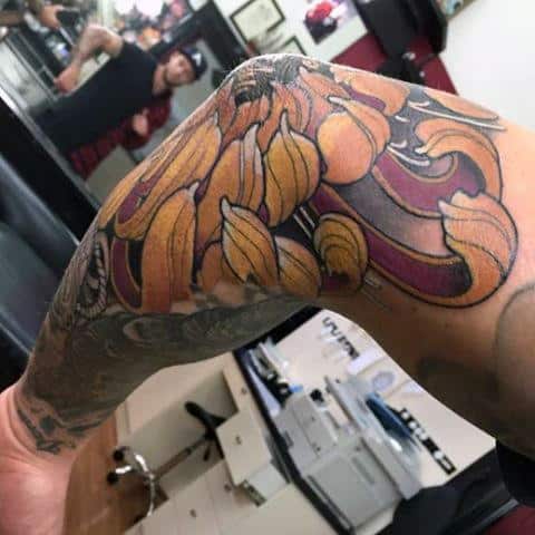 Mens Flower Petal Elbow Tattoo In Yellow Ink