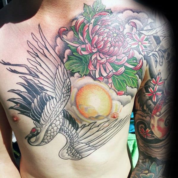 Mens Flower With Crane And Sun Chest Tattoos