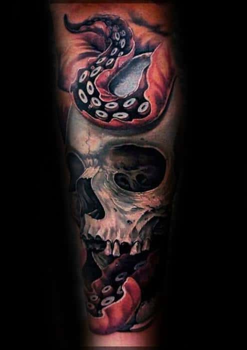 Skull with a vibrant octopus tentacle wrapping around it, featuring deep shading and vivid red details, creating a striking and dynamic tattoo design.