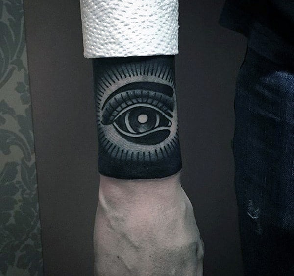 Mens Forearm Black Eye Patch Tattoo