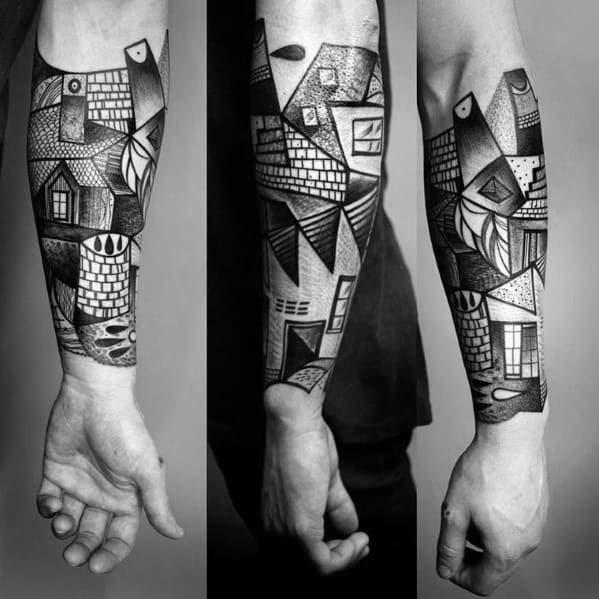 Full forearm Cubist tattoo in black and grey featuring abstract buildings, rooftops, and textures with strong linework and detailed shading.