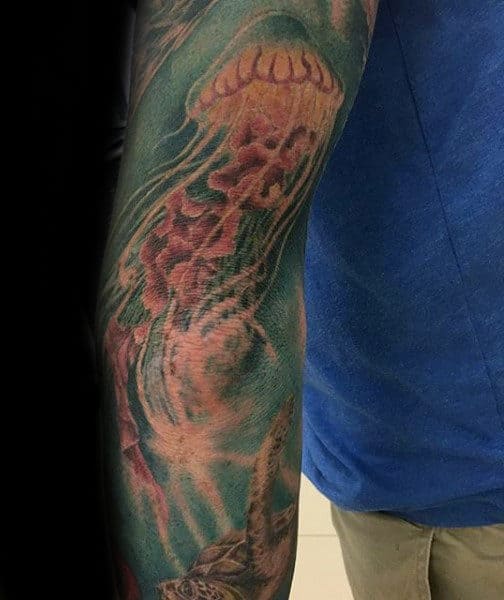 Mens Forearms Blue Sea And Jellyfish Tattoo