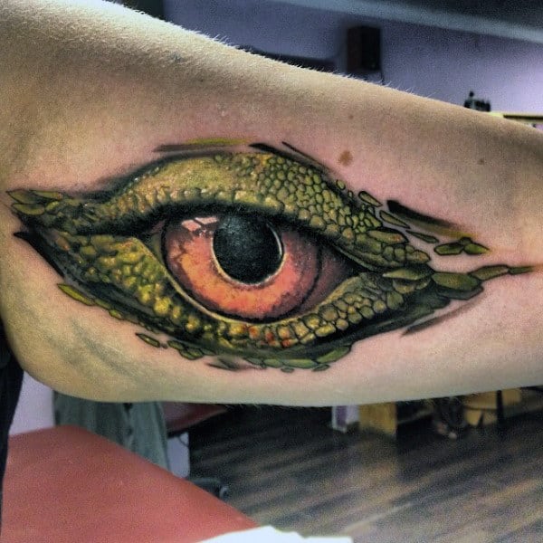 Mens Forearms Honey Colored Lizard Eye Tattoo