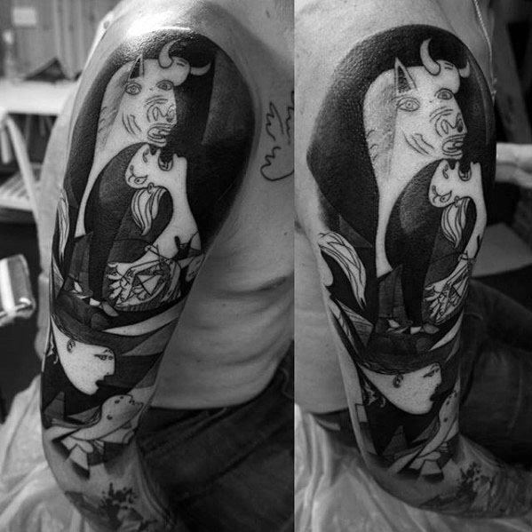 Bold upper arm tattoo inspired by Picasso’s *Guernica*, featuring the iconic bull and expressive figures in a dynamic blackwork style.